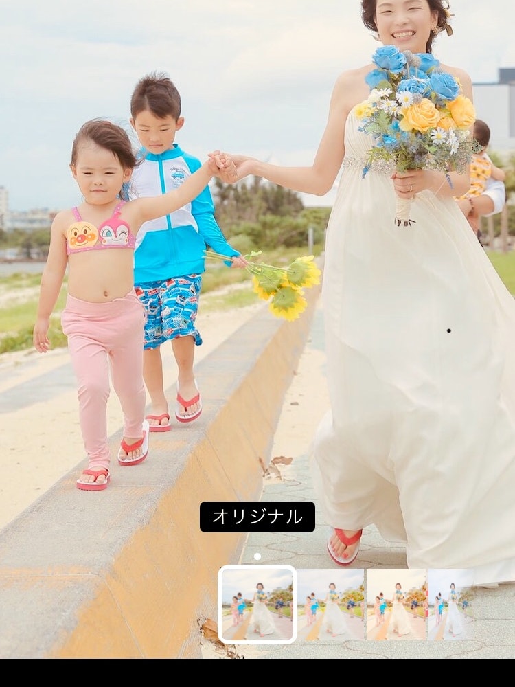 [相片1]我在雨季訪問了沖繩，在海灘上紀念我與孩子們結婚七周年。