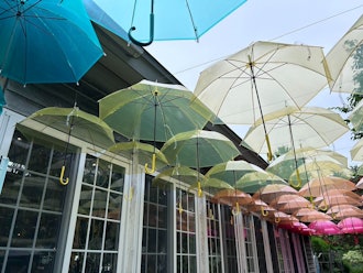 [Image2]Tokachi Hills' Umbrella Sky 🩵💙💜💛🧡🩷Hokkaido's largest colorful umbrella is hoisted overhead, and the 