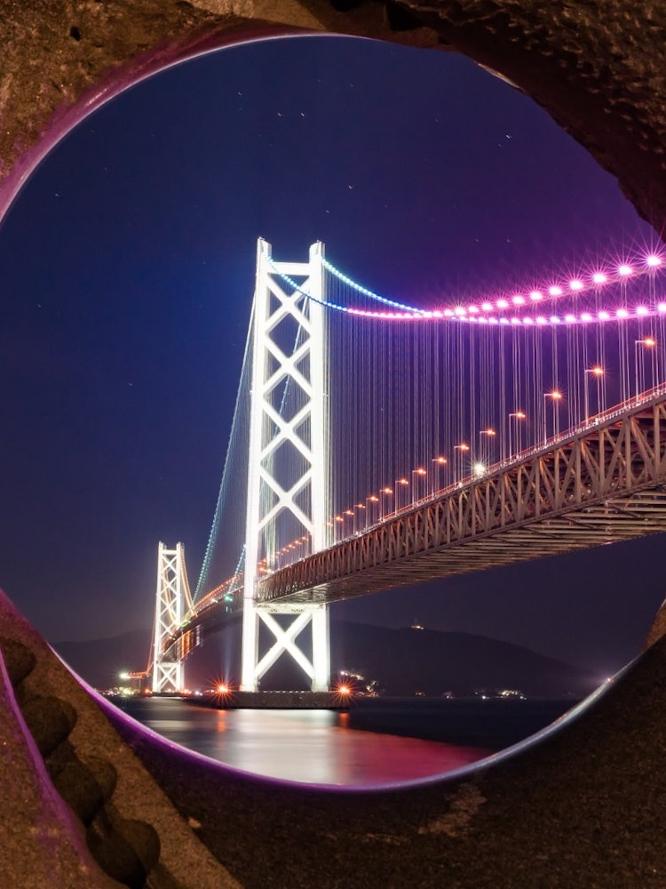 [画像1]地元のシンボル明石海峡大橋夢レンズにて兵庫県神戸市明石海峡大橋普段見慣れてるのであまり撮影はしないのですが、カメラのレンズから更に夢レンズ越しに