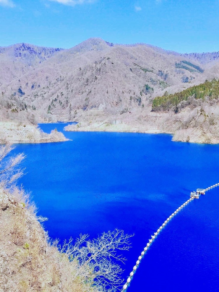 [Image1]It is Lake Okushiman in Gunma Prefecture.The lake, called Shiman Blue, was a superb view created by 