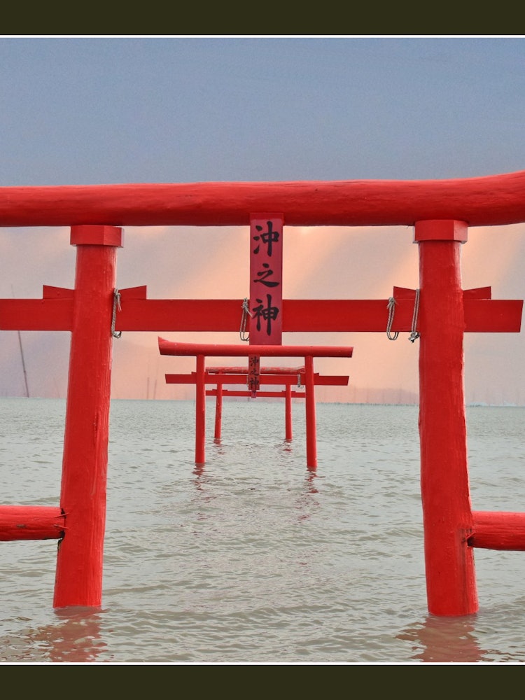 [Image1]#Underwater torii gate in Tara Town, Saga Prefecture and the light awn of the rising sunIt's a battl