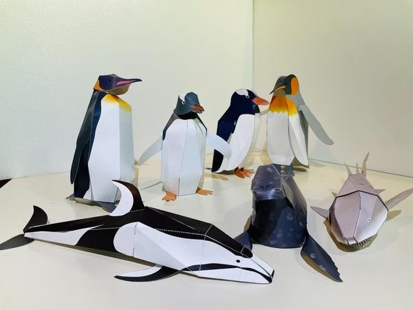 [画像2]2月11日(日)は「見て！聞いて！ 作ってみよう！ ニクスの仲間たち」です。作れるペーパークラフトは全部で7種類！ キングペンギン・ジェンツーペンギン、カマイルカ、ゼニガタアザラシ、シロワニです。キン