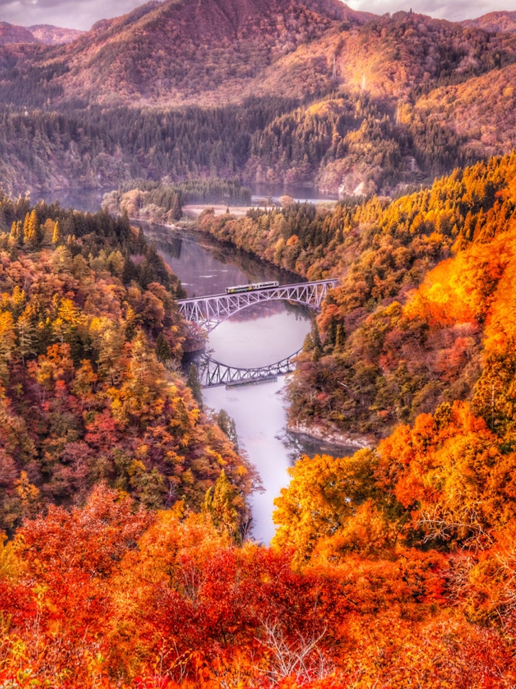 [Image1]Reflection 💠 of the Tadami Line × autumn leaves ×sunset× of the Tadami River Bridge of the First Tad