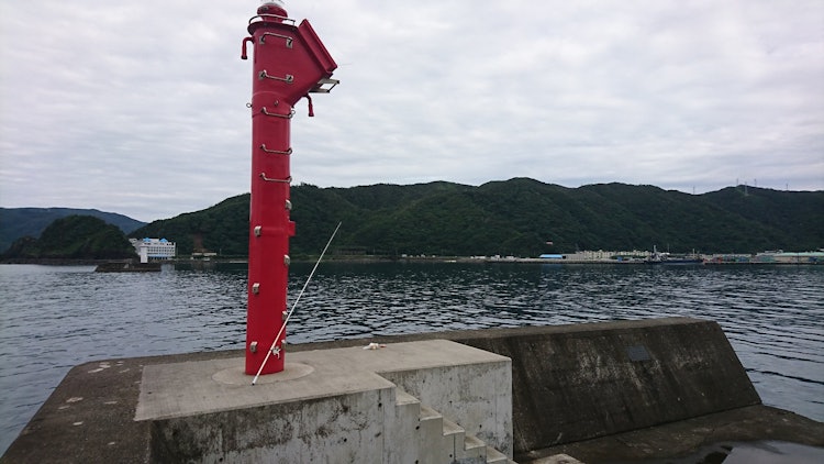 [Image1]Red lighthouse in Naze, Amami Oshima, Kagoshima Prefecture. There is an ocean nearby on the island, 